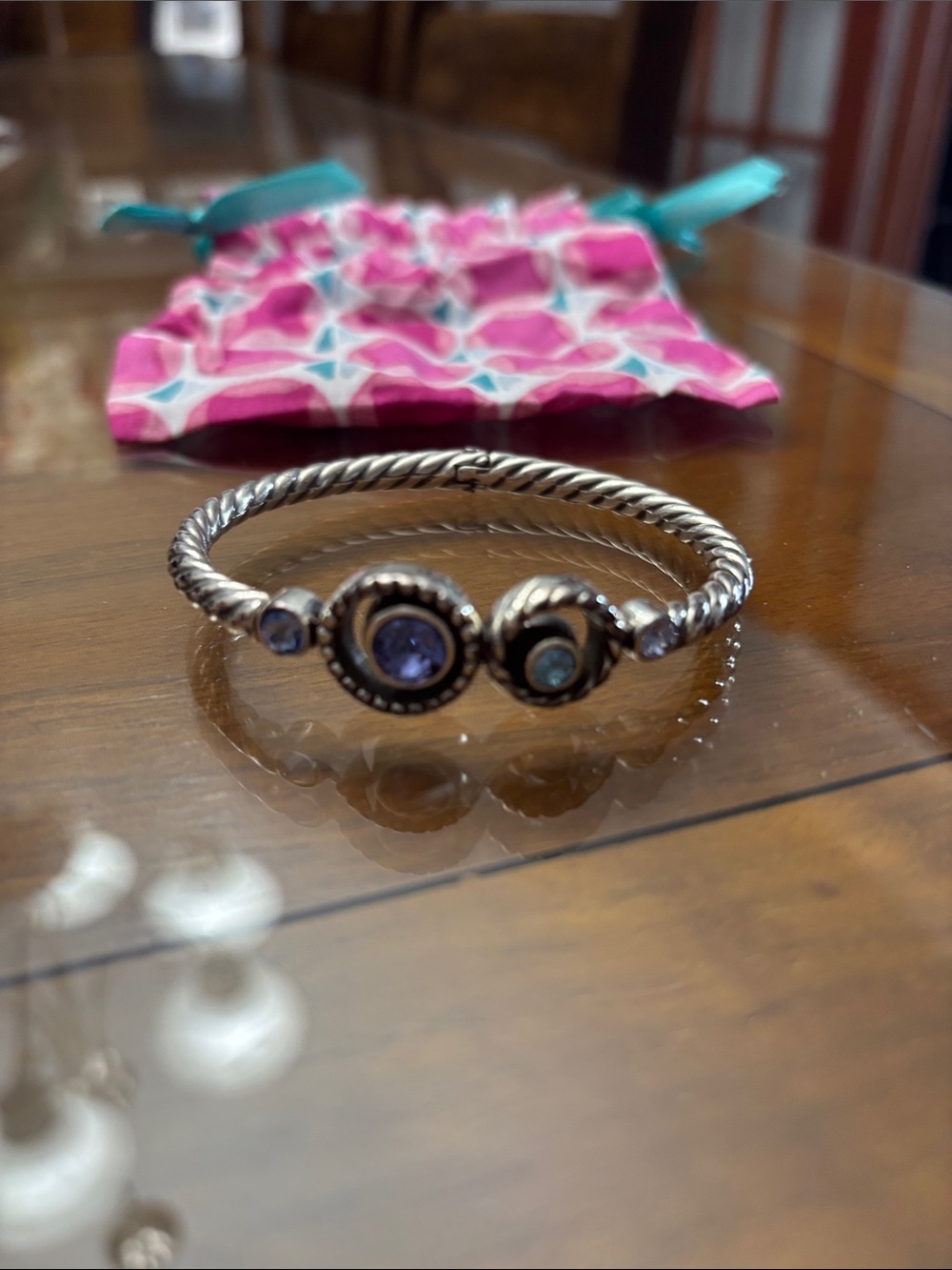 Brighton Silver-Tone Twisted Bangle with Blue Accents with magnetic closure